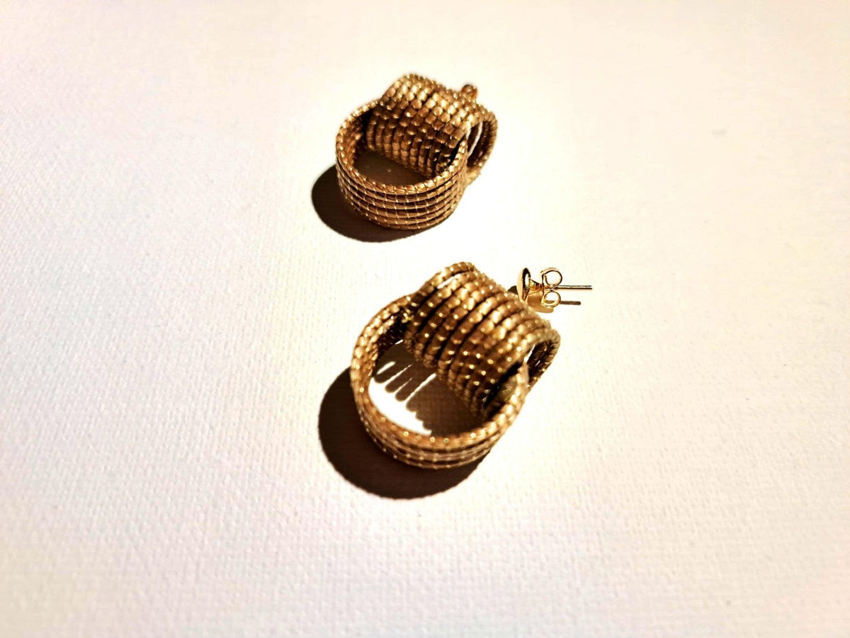 Boucles d'oreilles artisanales en capim dourado, l’or végétal du Brésil