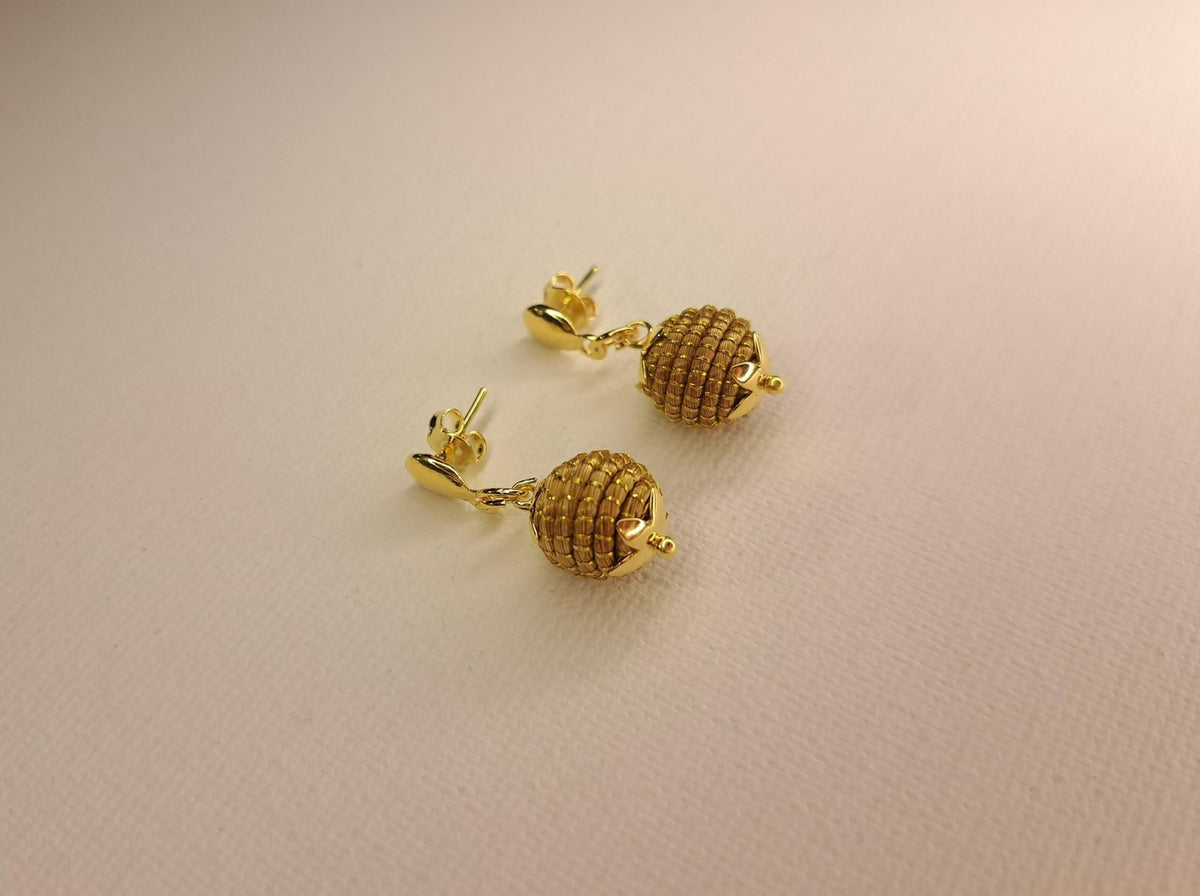 Boucles d'oreilles artisanales en capim dourado, l’or végétal du Brésil