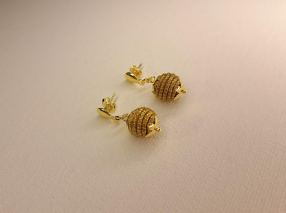 Boucles d'oreilles artisanales en capim dourado, l’or végétal du Brésil