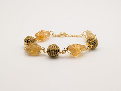 Bracelet en citrine naturelle et boules tressées en Capim Dourado (or végétal), bijou artisanal du Brésil