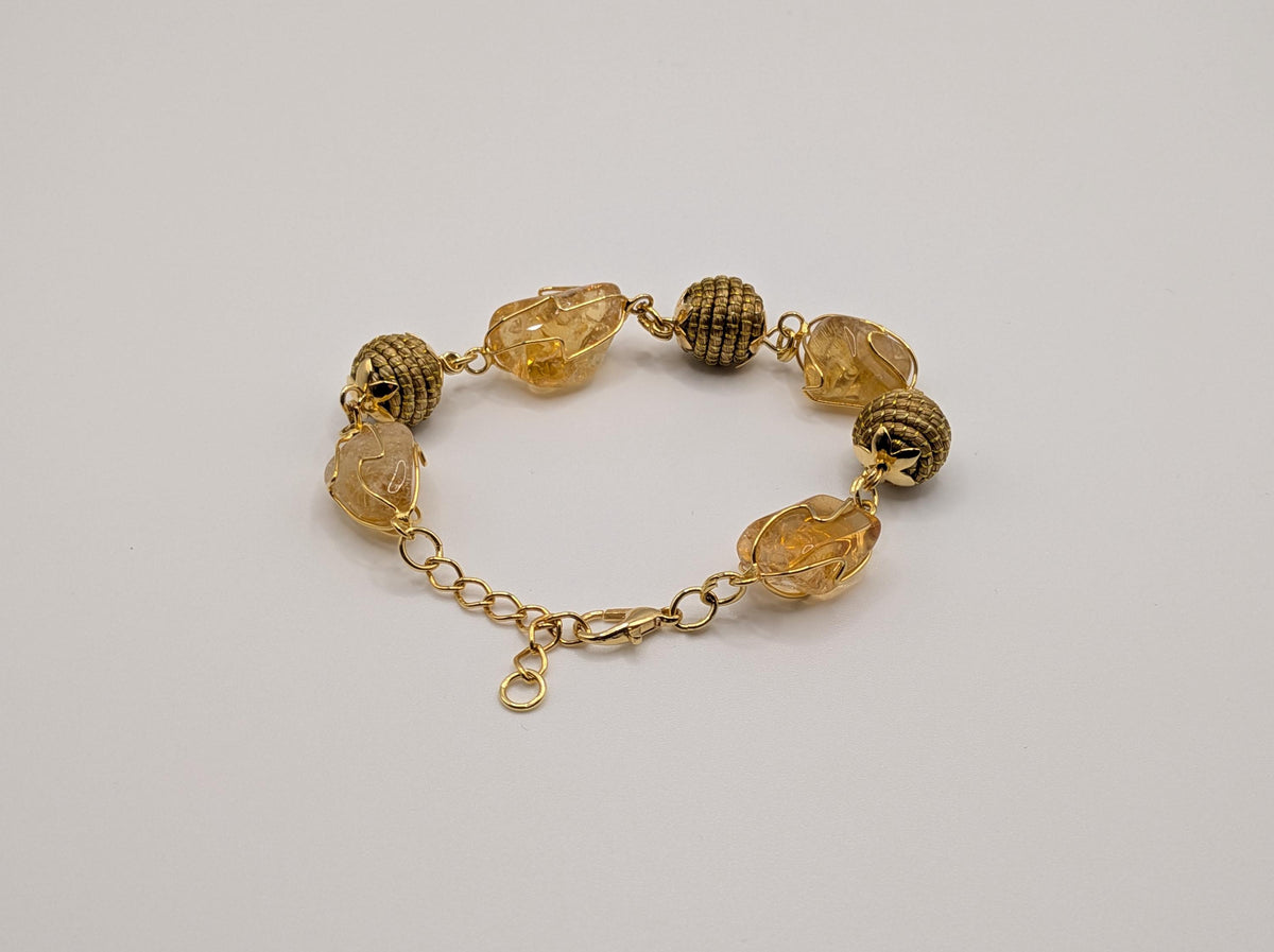 Bracelet en citrine naturelle et boules tressées en Capim Dourado (or végétal), bijou artisanal du Brésil