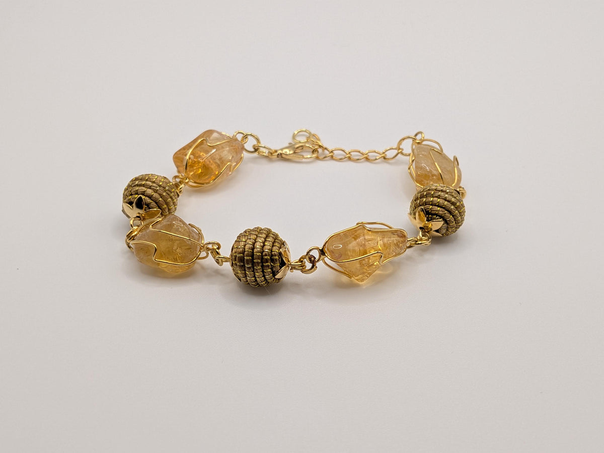 Bracelet en citrine naturelle et boules tressées en Capim Dourado (or végétal), bijou artisanal du Brésil