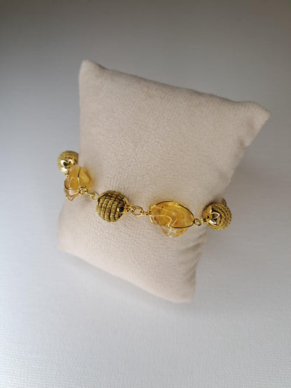 Bracelet en citrine naturelle et boules tressées en Capim Dourado (or végétal), bijou artisanal du Brésil