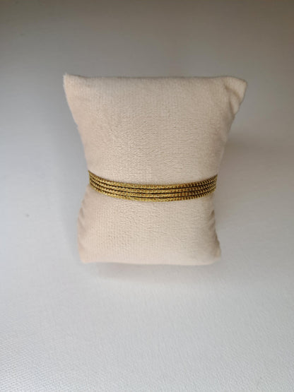 Bracelet à quatre rangs en Capim Dourado, or végétal tressé du Brésil