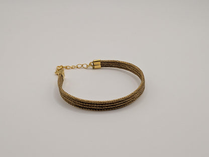 Bracelet à quatre rangs en Capim Dourado, or végétal tressé du Brésil