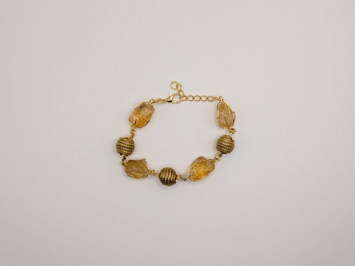 Bracelet en citrine naturelle et boules tressées en Capim Dourado (or végétal), bijou artisanal du Brésil