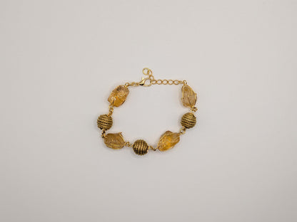 Bracelet en citrine naturelle et boules tressées en Capim Dourado (or végétal), bijou artisanal du Brésil