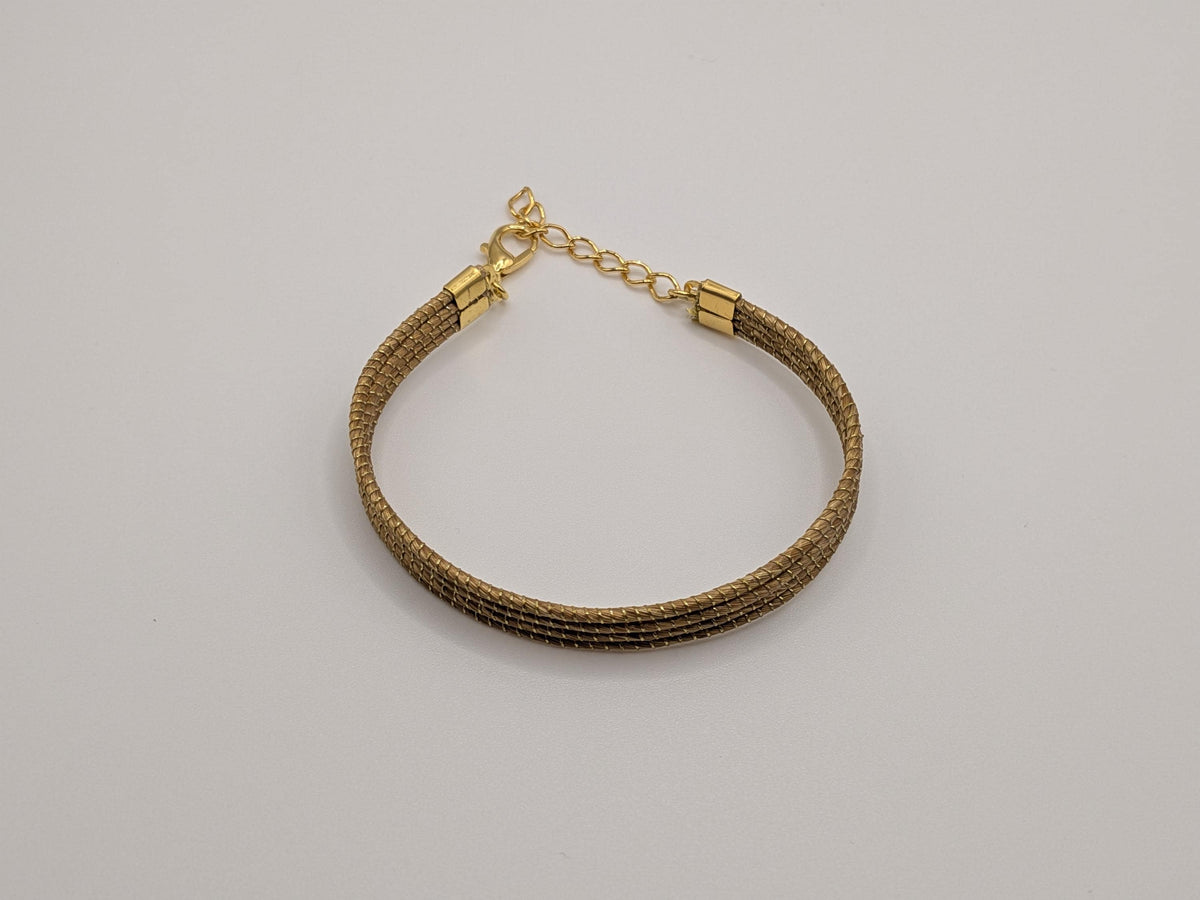 Bracelet à quatre rangs en Capim Dourado, or végétal tressé du Brésil