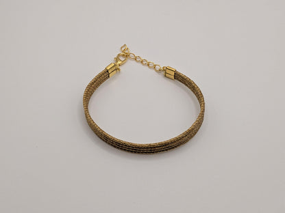 Bracelet à quatre rangs en Capim Dourado, or végétal tressé du Brésil