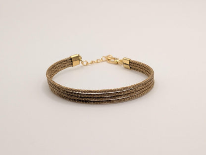 Bracelet à quatre rangs en Capim Dourado, or végétal tressé du Brésil