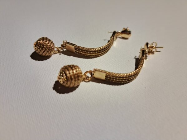 Boucles d’oreilles en capim dourado – or végétal artisanal