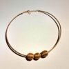 Collier artisanal en capim dourado, l’or végétal du Brésil