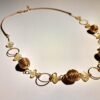 Collier artisanal en capim dourado, l’or végétal du Brésil