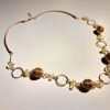 Collier artisanal en capim dourado, l’or végétal du Brésil
