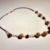 Collier artisanal en capim dourado, l’or végétal du Brésil