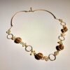 Collier artisanal en capim dourado, l’or végétal du Brésil