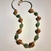 Collier artisanal en capim dourado, l’or végétal du Brésil