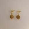 Boucles d'oreilles artisanales en capim dourado, l’or végétal du Brésil