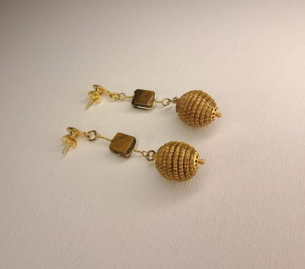 Boucles d'oreilles artisanales en capim dourado, l’or végétal du Brésil