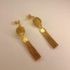 Boucles d'oreilles artisanales en capim dourado, l’or végétal du Brésil