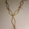 Collier artisanal en capim dourado, l’or végétal du Brésil