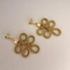 Boucles d'oreilles artisanales en capim dourado, l’or végétal du Brésil