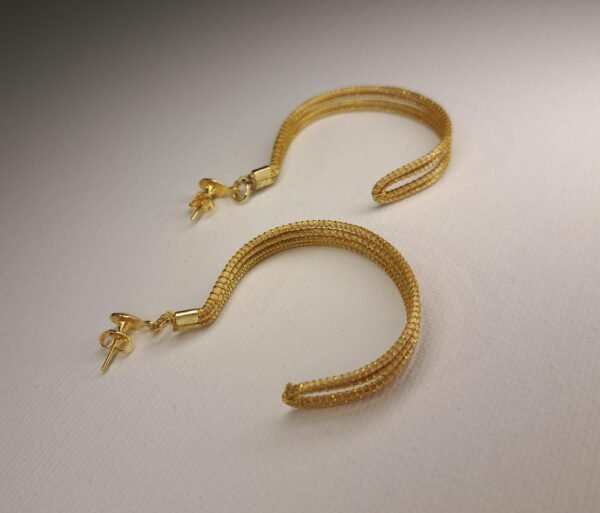 Boucles d'oreilles artisanales en capim dourado, l’or végétal du Brésil