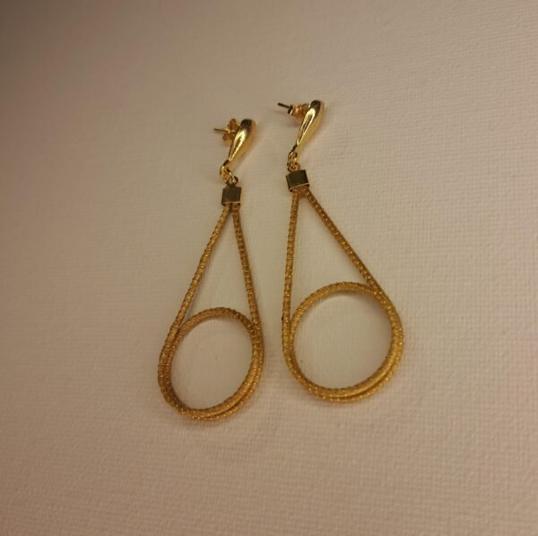 Boucles d'oreilles artisanales en capim dourado, l’or végétal du Brésil