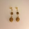 Boucles d'oreilles artisanales en capim dourado, l’or végétal du Brésil