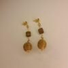 Boucles d'oreilles artisanales en capim dourado, l’or végétal du Brésil