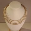 Collier artisanal en capim dourado, l’or végétal du Brésil