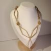 Collier artisanal en capim dourado, l’or végétal du Brésil