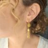 Boucles d'oreilles artisanales en capim dourado, l’or végétal du Brésil
